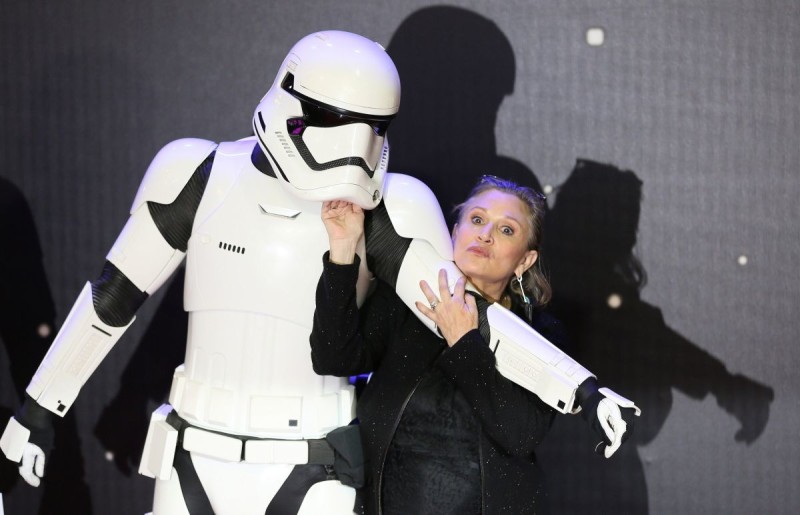 FILE PHOTO - Carrie Fisher  poses for cameras as she arrives at the European Premiere of Star Wars, The Force Awakens in Leicester Square, London